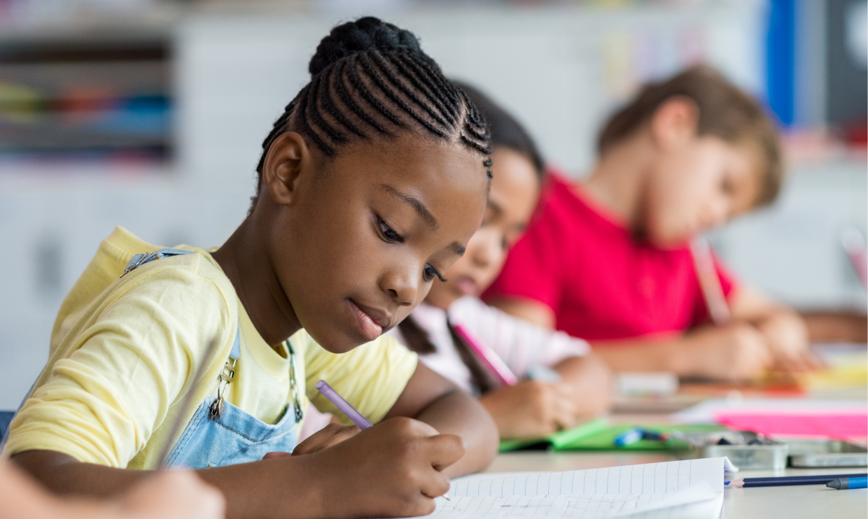 Student in class writing