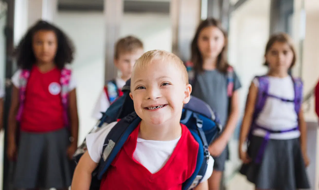 Child with a disability at school with peers