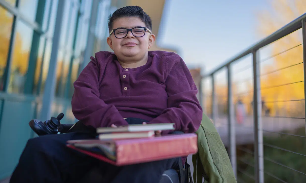 Young adult with disabilities at school